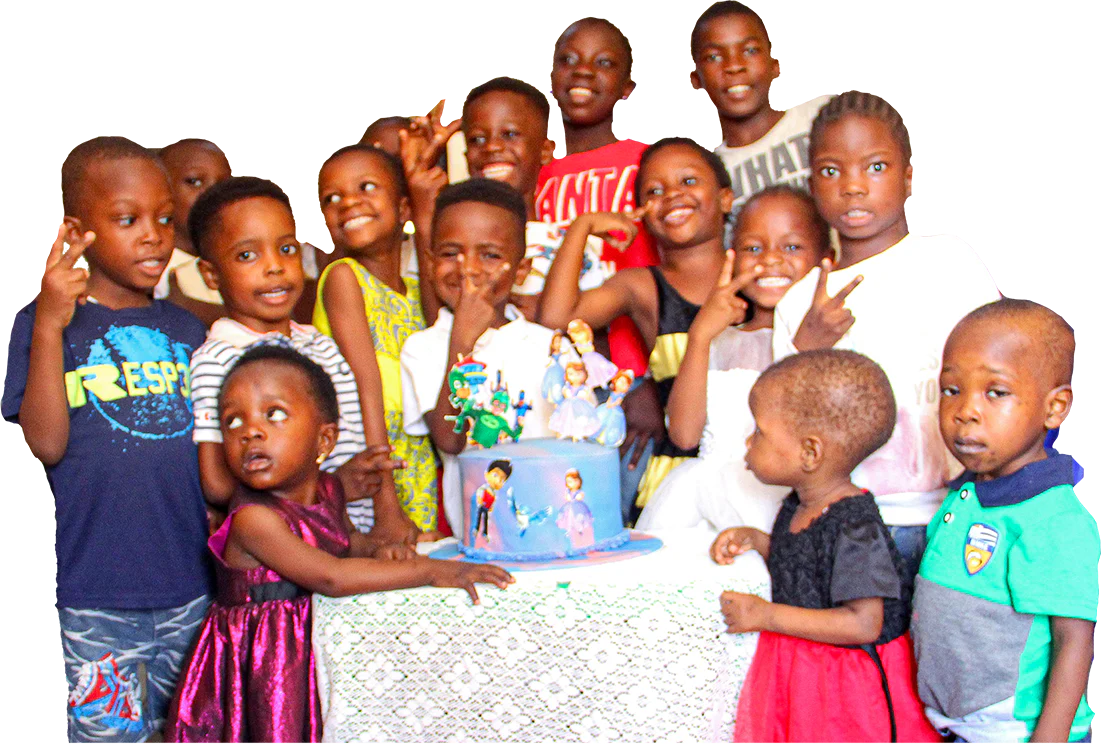 Group of kids around a birthday cake